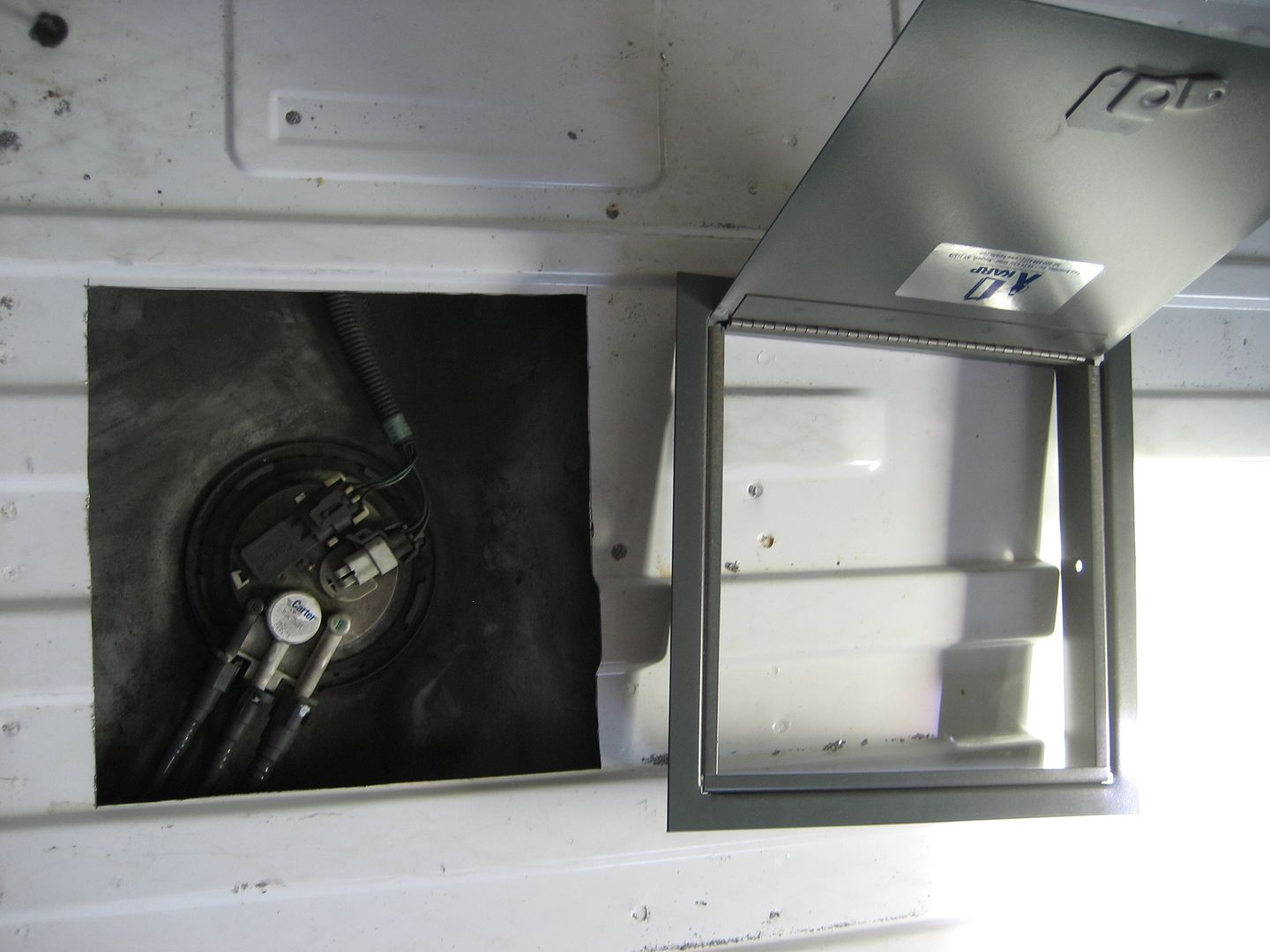 • Fuel Pump Floor Cutout Location